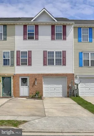 Rent this 3 bed house on 7831 Rolling View Avenue in Overlea, MD 21236