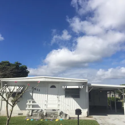 Rent this 3 bed house on 1513 Southwest 65th Terrace in Palm Beach County, FL 33428