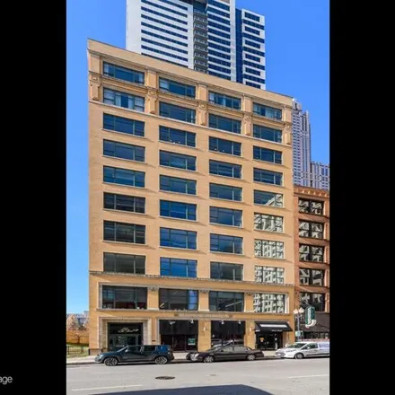 Rent this 4 bed condo on Vogue Building in 412 South Wells Street, Chicago
