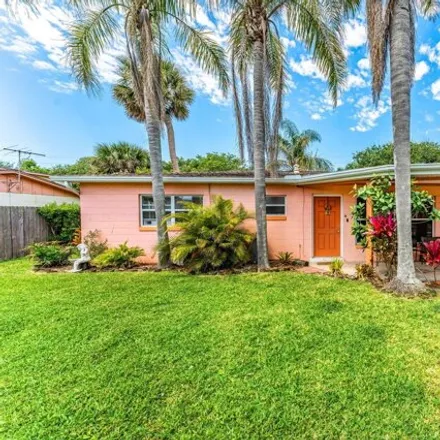Buy this 4 bed house on 214 S Orlando Ave in Cocoa Beach, Florida