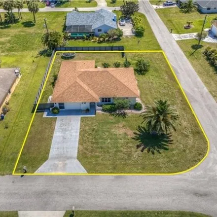 Buy this 4 bed house on 1211 Albemarle Circle in Lehigh Acres, FL 33936