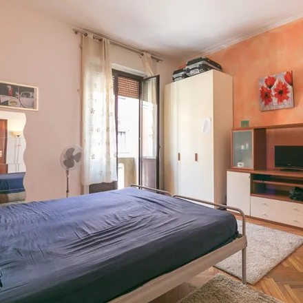 Rent this 4 bed room on Via Giulio Tarra in 7, 20125 Milan MI