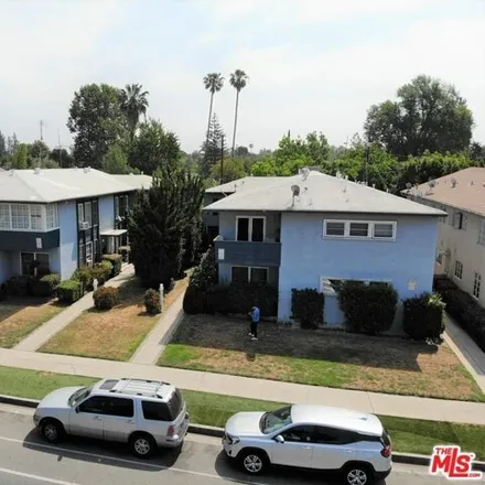 Buy this 16 bed townhouse on 5868 Woodman Avenue in Los Angeles, CA 91401