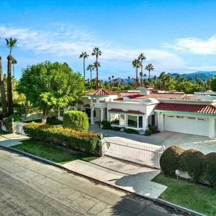 Buy this 4 bed house on 871 East Tamarisk Road in Palm Springs, CA 92262