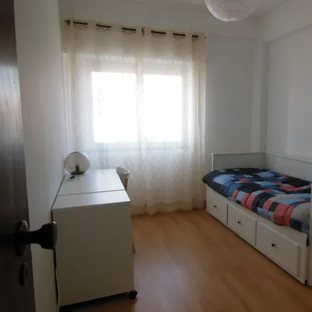 Rent this 3 bed room on Rua Professor Mira Fernandes Lote 2 in 1900-386 Lisbon, Portugal