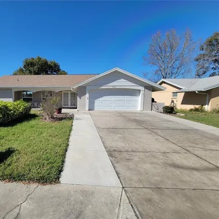 Rent this 3 bed house on 8280 Woodsong Row in Bayonet Point, FL 34667