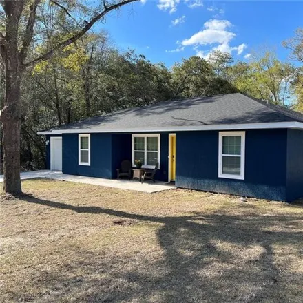 Rent this 3 bed house on 19199 Saint Augustine Drive in Dunnellon, Marion County