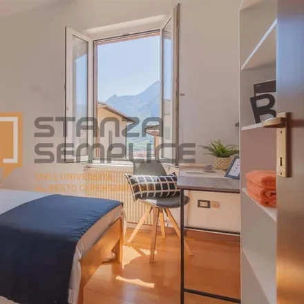 Rent this 2 bed room on Via delle Cave 24 in 38122 Trento TN, Italy