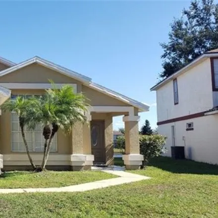 Rent this 4 bed house on 14299 Avonlea Court in Meadow Woods, Orange County