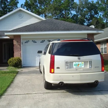 Rent this 3 bed house on 7511 Cliff Cottage Drive in Jacksonville, FL 32244