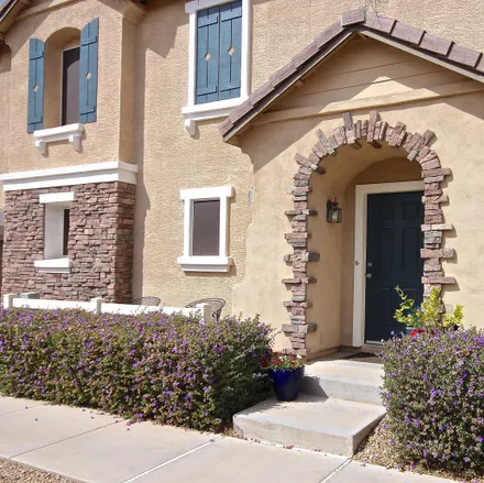 Rent this 3 bed townhouse on North Adler Street in Gilbert, AZ 85233