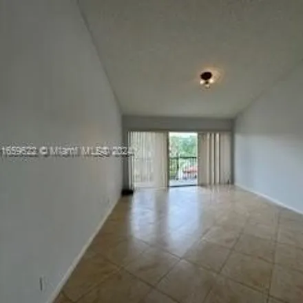 Rent this 3 bed condo on 8955 Wiles Rd Apt 308 in Coral Springs, Florida