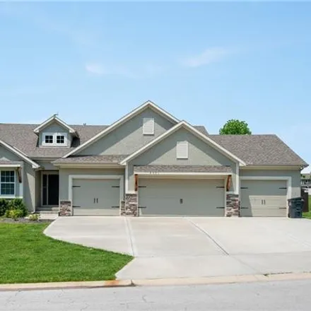 Buy this 4 bed house on 5130 Southwest Marguerite Street in Blue Springs, MO 64015