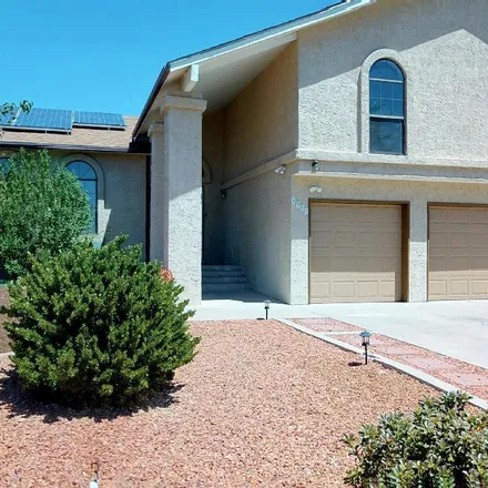 Buy this 4 bed house on 6317 Buenos Aires Place Northwest in Albuquerque, NM 87120