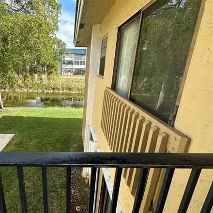 Rent this 2 bed condo on Riverside Drive in Coral Springs, FL 33065