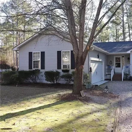 Rent this 3 bed house on 347 Moss Pink Drive in Woodlake Country Club, Moore County