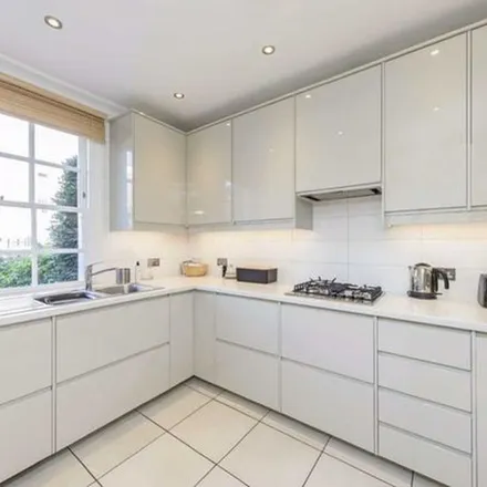 Rent this 4 bed townhouse on St Johns Wood Barbers in 10 St. Ann's Terrace, London