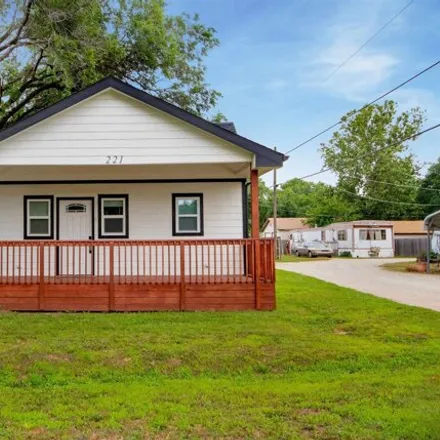 Buy this 2 bed house on 221 E 7th Ave in Belle Plaine, Kansas