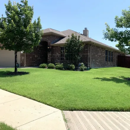 Rent this 3 bed apartment on 415 Coral Vine Lane in Burleson, TX 76028