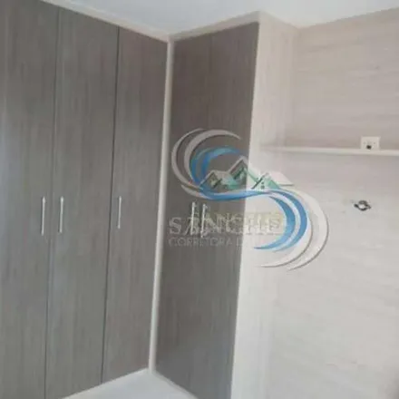 Buy this 4 bed apartment on Avenida Carlos Martiniano de Andrade Bittencourt in Aviação, Praia Grande - SP