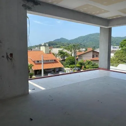 Buy this 4 bed house on Rua dos Araçás in Lagoa da Conceição, Florianópolis - SC