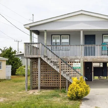 Buy this 2 bed house on 102 East Wilson Street in Kill Devil Hills, NC 27948