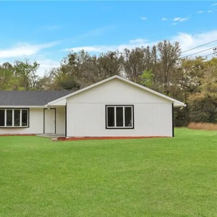 Buy this 3 bed house on 5281 County Road 235 in Newberry, FL 32615