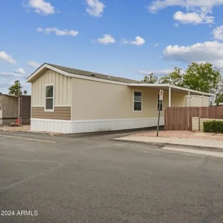 Buy this studio apartment on Mobile Home Park in Glendale, AZ 85301