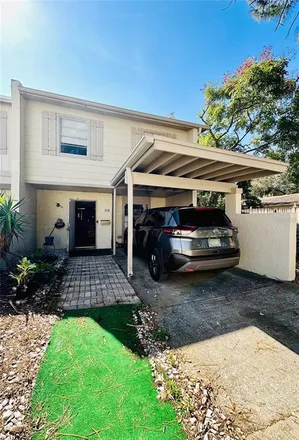 Buy this 3 bed townhouse on 5122 Tennis Court Circle in Tampa, FL 33617