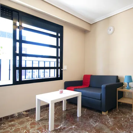 Rent this 4 bed room on Carrer de Fontanars dels Alforins in 17, 46007 Valencia