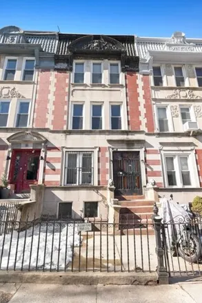 Buy this 5 bed townhouse on 8 Saint Charles Place in New York, NY 11216