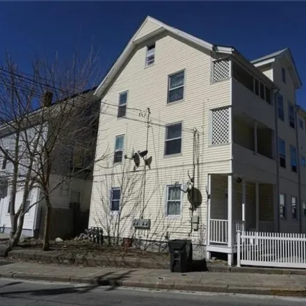 Buy this 9 bed house on 299 Rand Street in Central Falls, RI 02863