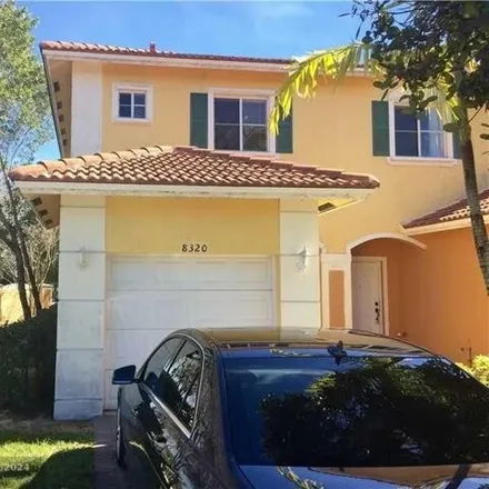 Rent this 3 bed townhouse on 10586 Southgate Boulevard in Tamarac, FL 33321