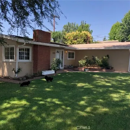 Rent this 3 bed house on 727 E Palm Ave in Redlands, California