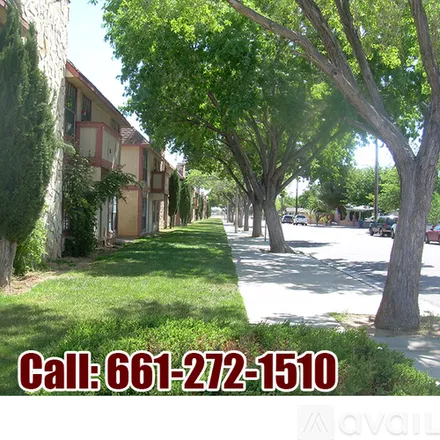 Rent this 2 bed apartment on 215 E Ave Q 10