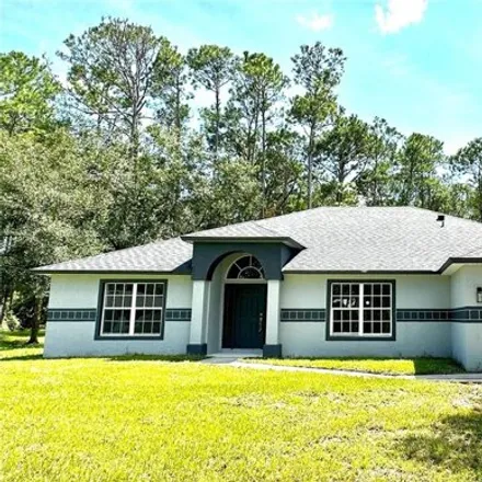 Buy this 4 bed house on 2585 Coachman Drive in Deltona, FL 32738
