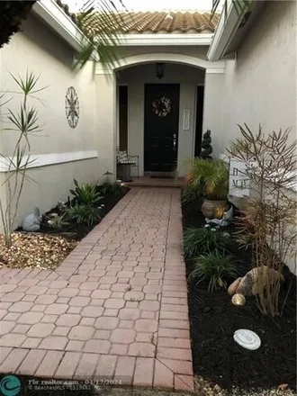 Buy this 3 bed house on Northwest 49th Street in Coconut Creek, FL 33073