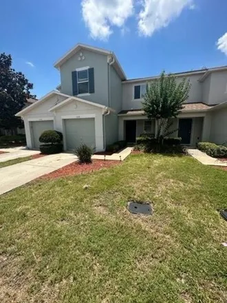 Rent this 3 bed townhouse on Chalcedony Street in Osceola County, FL 34744