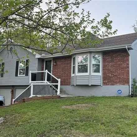 Buy this 4 bed house on 2615 Southwest Walnut Street in Blue Springs, MO 64015