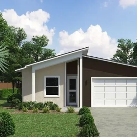 Buy this 4 bed house on 480 Southwest Scanlon Road in Palm Bay, FL 32908