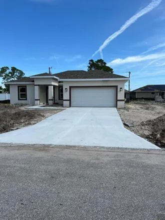 Buy this 4 bed house on 21376 Hawthorne Avenue in Charlotte County, FL 33954