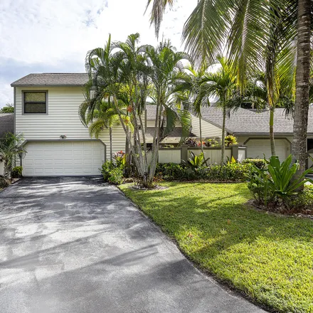 Buy this 3 bed townhouse on 2582 Bedford Mews Drive in Wellington, Palm Beach County