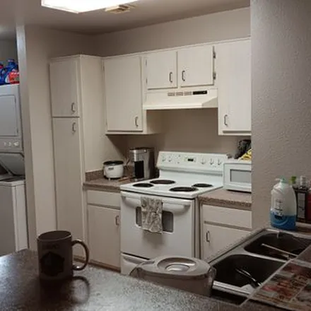 Rent this 4 bed apartment on North Waddell Lane in Tucson, AZ 85745