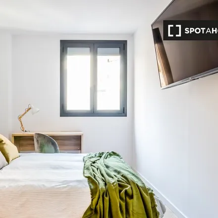 Rent this 4 bed room on Sana Books in Passatge de Montserrat de Andrés, 13- 1ero-2da