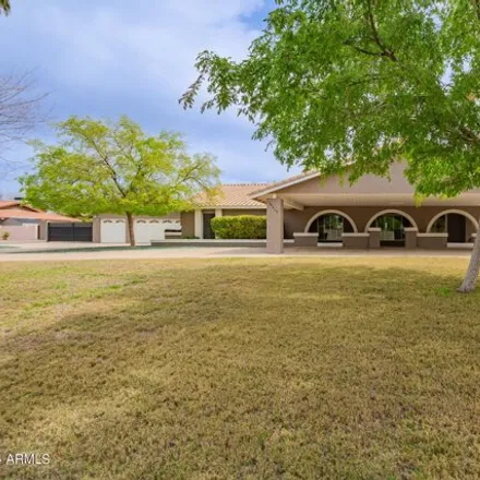Buy this 5 bed house on 14219 North 69th Drive in Peoria, AZ 85381