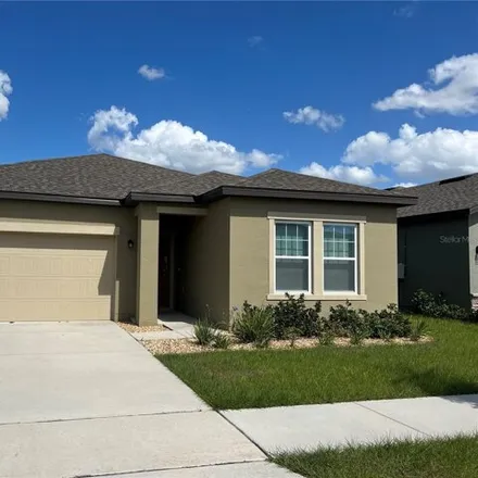 Rent this 3 bed house on Orchid Grove Boulevard in Davenport, Polk County