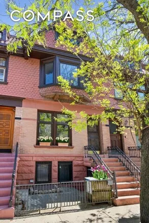 Buy this 5 bed townhouse on 73 Downing Street in New York, NY 11238