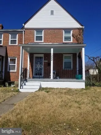 Rent this 3 bed house on 1222 Harwood Avenue in Baltimore, MD 21239