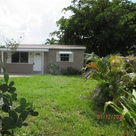 Rent this 3 bed house on 2656 Northeast 14th Terrace in Collier Manor, Pompano Beach
