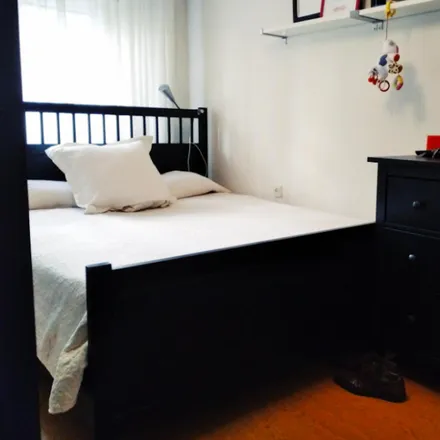 Rent this 3 bed room on Madrid in Calle de Ricardo Ortiz, 98